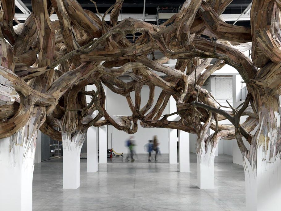 Henrique Oliveira (b. 1973, Brazil). Baitogogo. 2013. Palais de Tokyo, Paris. Plywood and tree branches. 6,74 × 11,79 × 20,76 m. Photo: André Morin.