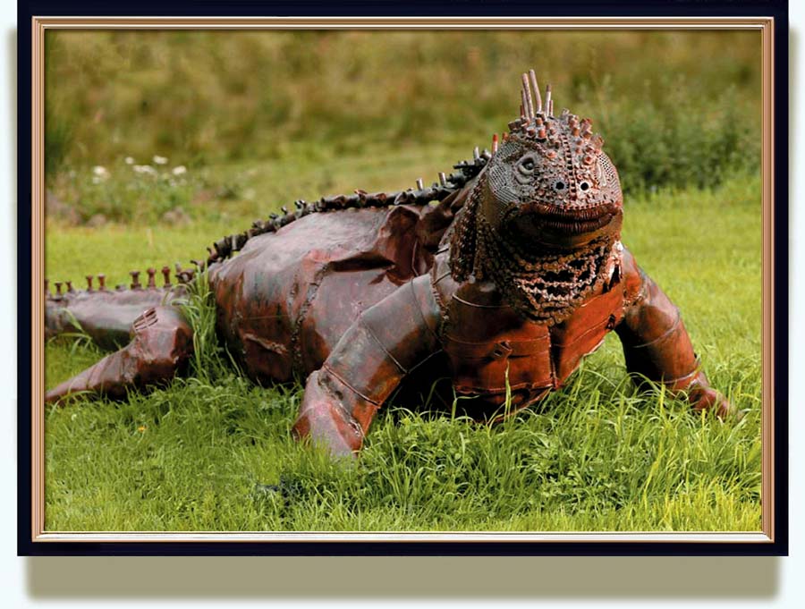 Helen Denerley (b. 1956 in Midlothian, Scotland. Now living in Strathdon, Aberdeenshire, Scotland). Time and tide. 1999. 420cm long steel. Large Galapagos marine Iguana (called Agnes) welded from old oil drums, chains, bolts and other scrap. From the brochure «Helen Denerley: selected work from 1997–2010».