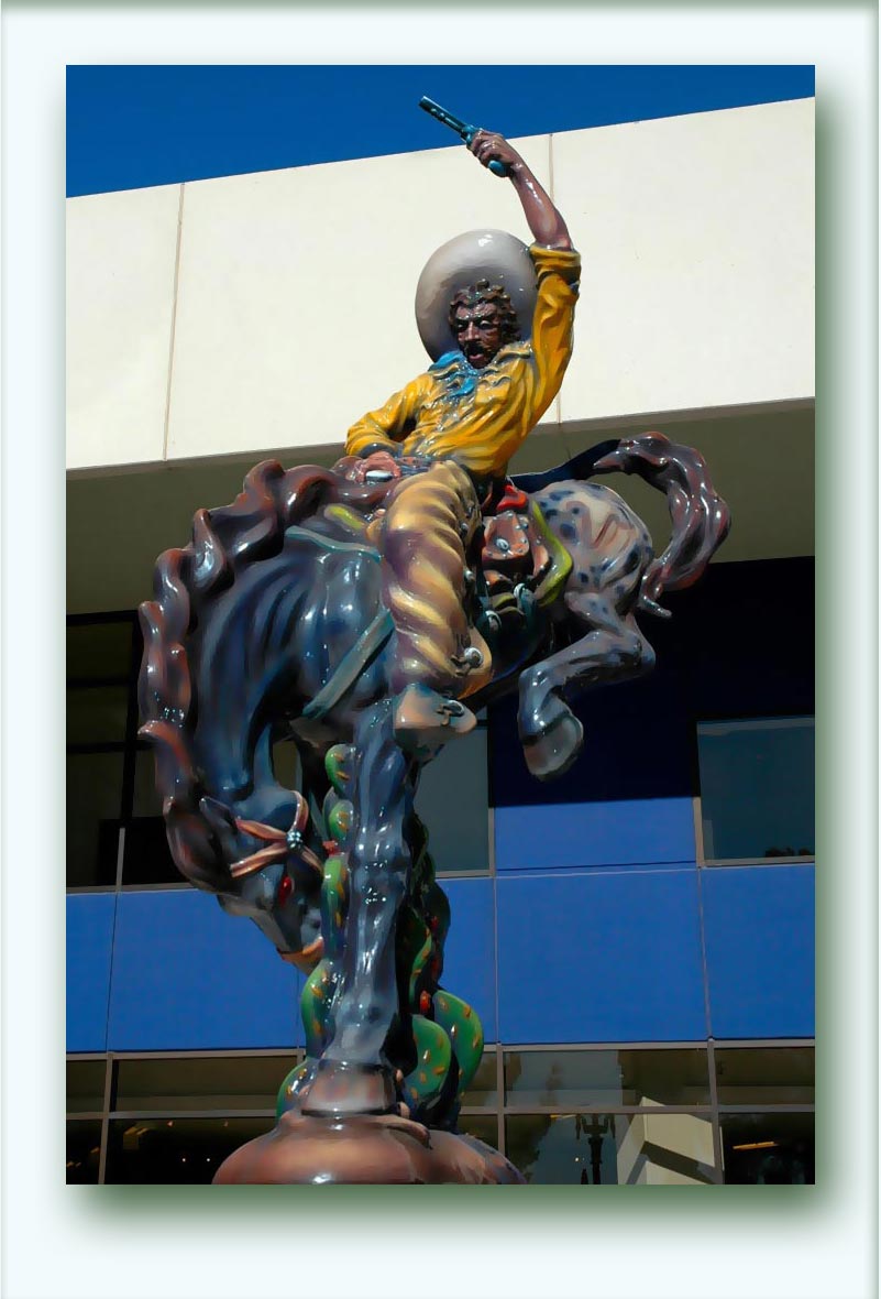 Luis Alfonso Jr. Jiménez (b. 1940  in El Paso, TX, US; d. 2006  in Hondo, NM, US). Vaquero. 20-foot-tall statue of a Mexican cowboy on a bucking horse. Polychrome fiberglass. In front of  El Paso Museum of Art.