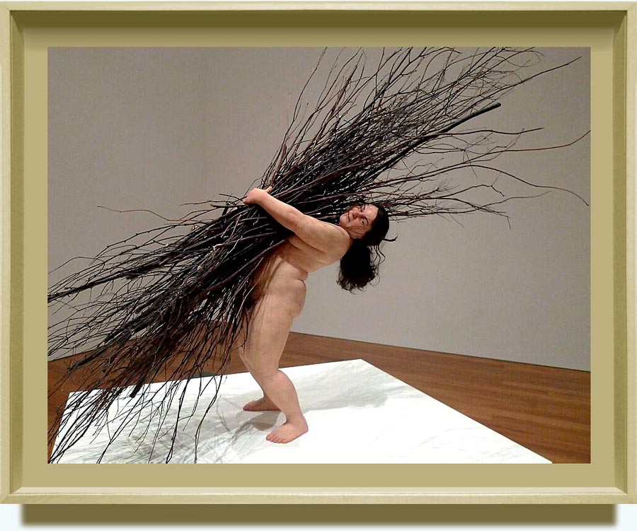 Ron Mueck (b.  1958 in Melbourne, Australia;  based in London). Woman with sticks. 2008. Silicone, polyurethane, steel, wood, synthetic hair. 170.0×183.0×120.0 cm. Private collection. Image courtesy of  Anthony d’Offay, London. http://www.flickr.com/photos/nhubbard1978/4984880127/