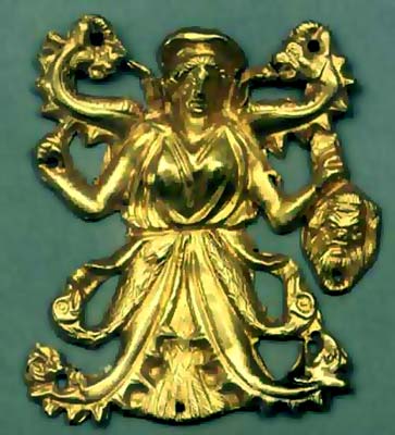 Бляшка “Богиня в калафе” из кургана Куль-Оба (IV в. до н.э.) Золото. Высота 3,3 см. Государственный Эрмитаж.
