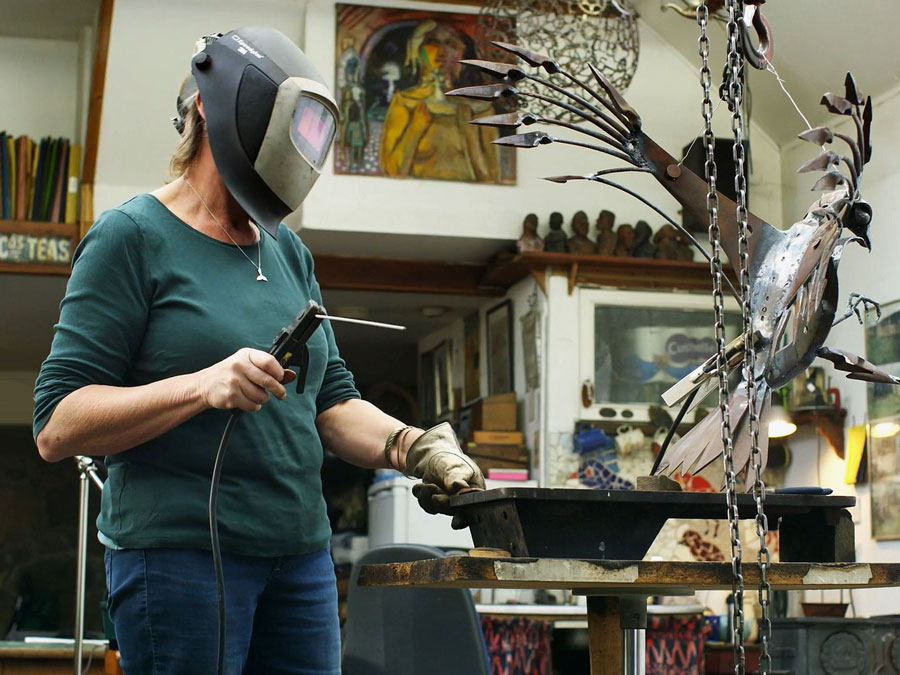 Helen Denerley (b. 1956 in Roslin, Midlothian, Scotland. Now living in Strathdon, Aberdeenshire, Scotland) in her workshop. 